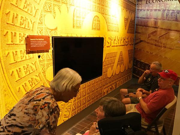 Golden exhibit featuring a television
