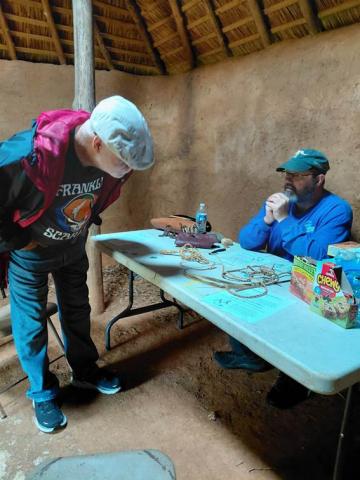 Keith discusses cordage making with a visitor to EIM.